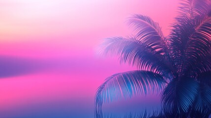 Obraz premium Serene sunset with palm tree silhouette against vibrant colors.