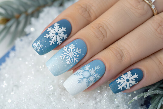 Blue winter nails with snowflake decorations