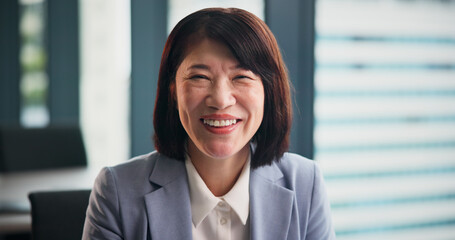 Smile, portrait and Japanese businesswoman in office with confidence in finance career for company....