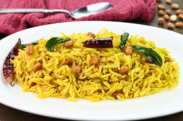Tamarind rice south indian rice dish served in a plate.