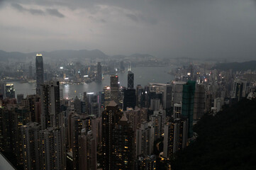 Hong Kong, Hong Kong, China - 11.17.2024 - evening view over Hong Kong harbour from the Peak