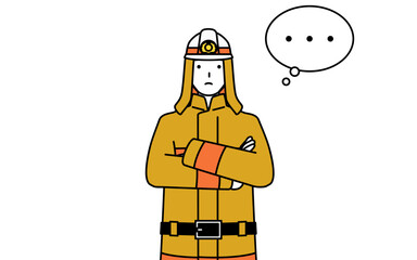 Firefighter in fire uniform with crossed arms, deep in thought.