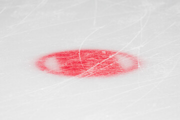 Red circle on ice hockey markings - faceoff spot in hockey