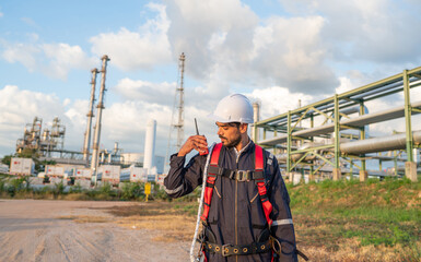 Mechanical engineer working and holding toolbox to checking and inspection gas pipeline.