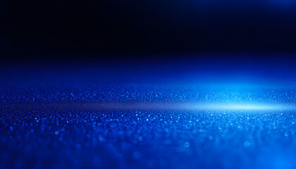 Obraz premium Blue gradient background grainy glowing blue light on dark backdrop noise texture effect