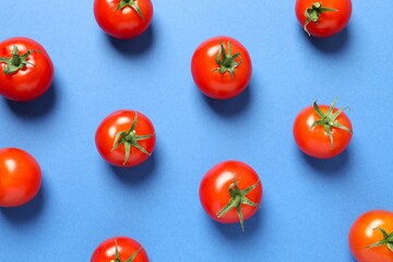 Flat lay composition with fresh cherry tomatoes on color background. Ripe vegetables