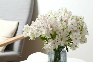 Beautiful white alstroemeria 
in a vase on the table