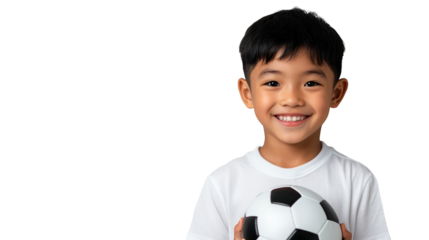 Joyful young boy holding soccer ball, a celebration of childhood, sports, and dreams