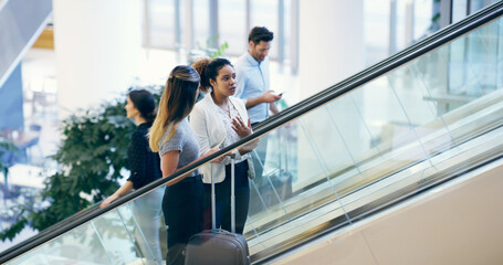 Business people, escalator and travel at airport with suitcase for flight, international journey...