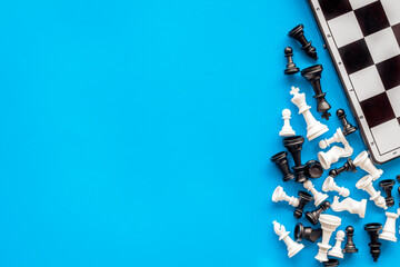 Chess piece on chess board top view. Game as competition in business or business strategy concept