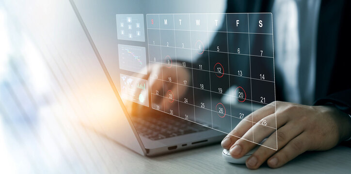 Managing a scheduled meeting.Businessman manages time to work efficiently and on time on all projects. Calendar work schedule, business plan concept.	