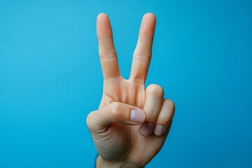 On a deep blue background, hands showing various signs with their fingers. Clear and expressive gestures emphasize the beauty of the movements and symbolism.