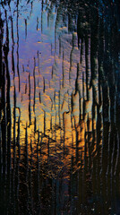 Reflections on rainy windows urban environment abstract colors evening light artistic perspective nature's beauty