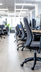 Empty Modern Office Interior With Rows Of Desks, Ergonomic Chairs, Computers, Minimalist Design
