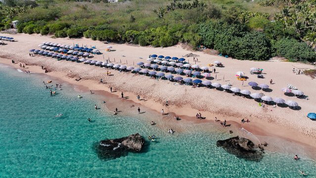 Relaxing beach day at Kenting Baishawan Taiwan with sun loungers and clear waters