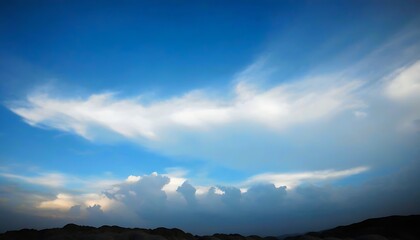 Obraz premium A romantic view soaring under the sky with beautiful white clouds as the backdrop