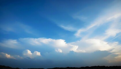 Obraz premium A romantic view soaring under the sky with beautiful white clouds as the backdrop