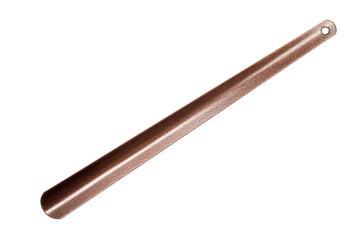 Long metal shoe spoon on a white background. New brown shoe spoon.