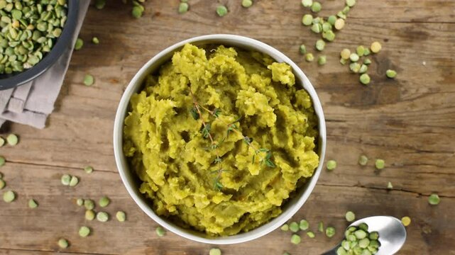 green pea puree with cream and herbs