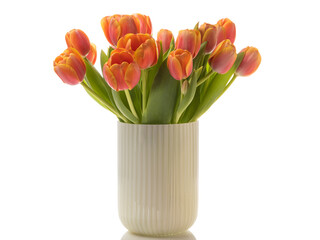 Bouquet  of orange tulips in a vase, isolated on white background