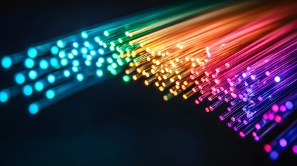 fiber optic installation concept. Vibrant fiber optic lights creating a colorful, dynamic flow against a dark background.