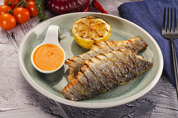 Grilled seabass fillet with lemon