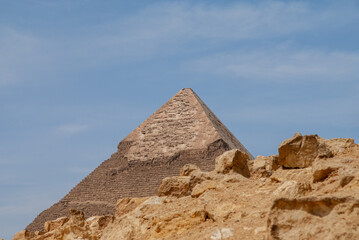 Pyramid complex on Giza plateau. Pyramid of Khafre, or rather Khafre, second largest ancient Egyptian pyramid against background of blue spring sky.
