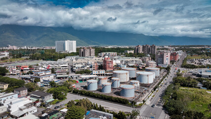 Fototapeta premium Aerial view of Hualien, Taiwans urban landscape with mountains on a clear day