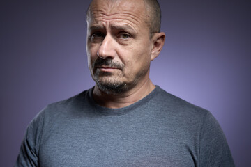Fototapeta premium Mature man with an expression of skepticism