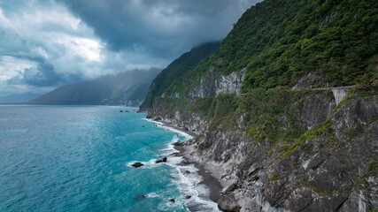 Breathtaking Hualien Taiwan coast with cliffs and turquoise waters under clouds