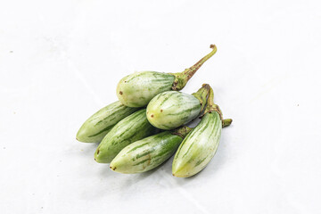 Small organic young green eggplant