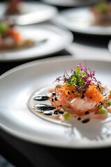 Elegant salmon dish with garnish on white plate