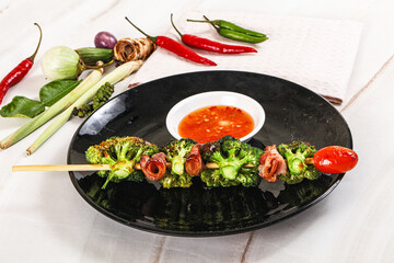 Thai Street foof satay with bacon and broccoli