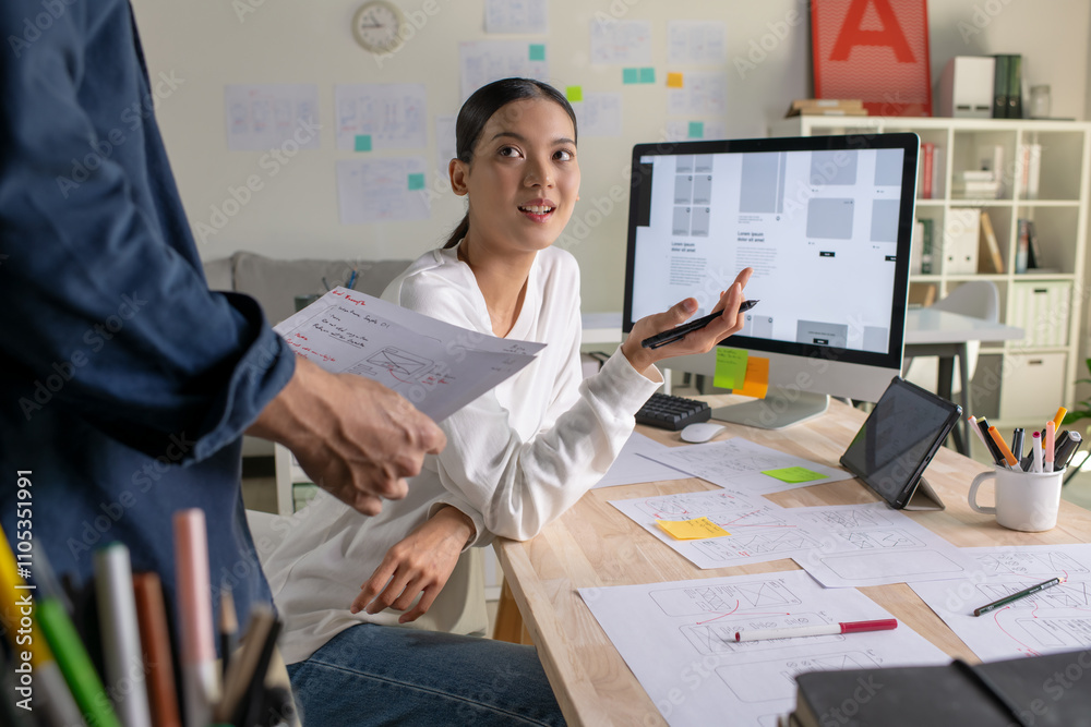 Poster ux ui designers discussing and brainstorming on wireframes for a website and mobile app prototype, i