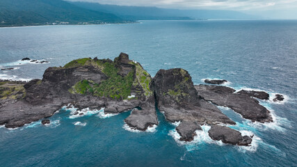 Aerial view of Sanxiantai island showcasing rocky formations and coastal waters in Taiwan