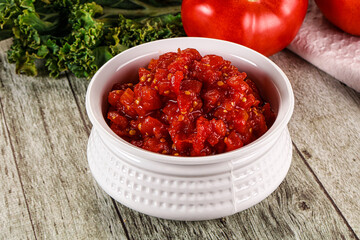 Diced ripe tomato with sauce