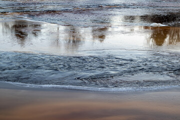 Kiiminkijoki river freezing over in Haukipudas, Oulu Finland