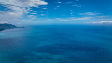 Fototapeta premium Beautiful aerial view of the tranquil blue ocean surrounding Taiwan under a clear sky