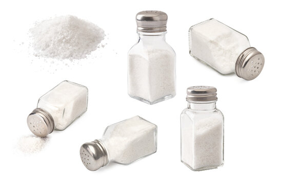 Salt shaker and heap of salt isolated. Set of salt on white background.