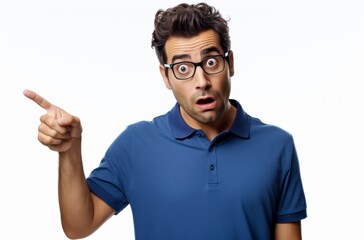 Fototapeta premium Surprised Man Pointing, closeup studio shot against a white background.