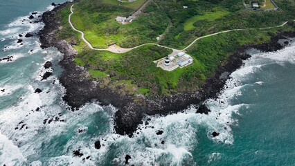 Scenic view of Taiwan rugged coastline and lush island landscape captured from above