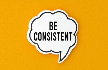 Be consistent concept written in a speech bubble. Yellow background, illustration.