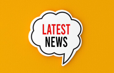 Latest news concept written in a speech bubble. Yellow background, illustration.
