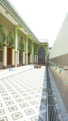 Obraz premium The background corner of the mosque is close to the ablution area, the mosque has a green nuance