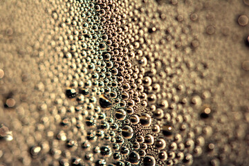 Tiny Bubbles on a Colour Background Condensation Gold Steam Water
