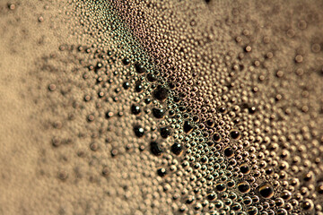 Tiny Bubbles on a Colour Background Condensation Gold Steam Water