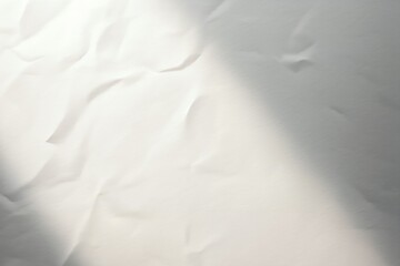 Obraz premium Plain white crumpled paper texture with soft shadows.