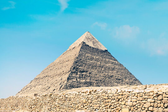 high pyramid of Chephren on the background of a blue sky with clouds, Giza, Cairo, Egypt. second pyramid. Pyramid of Khafra on a cloudy day