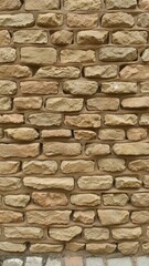 Obraz premium Weathered old brick wall made from rough stones with a rustic and aged appearance, details, grunge