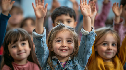 Joyful young students eagerly raising hands in the classroom
